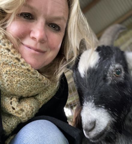 Selfie of winner Maxine with her black and white goat  
